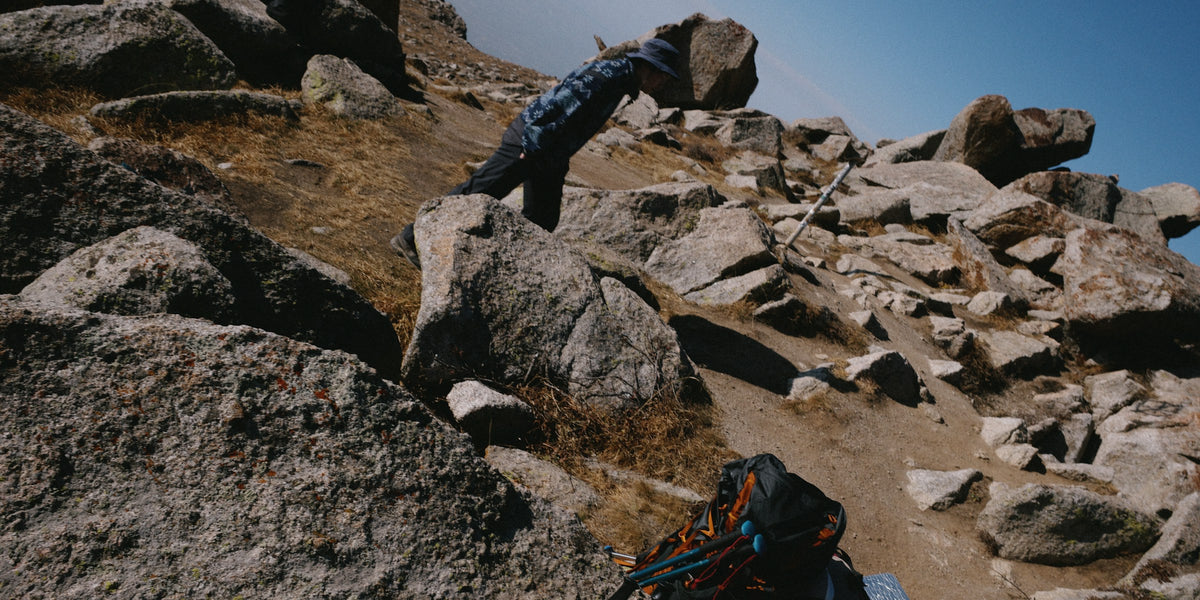 Hiker on a rocky mountain trail