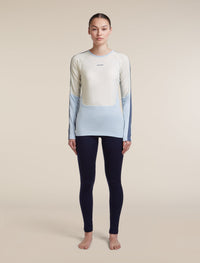 Icebreaker Women's Merino 200 Oasis+ Long Sleeve Crewe in Zinc Blue / Ecru Heather / Dawn, side