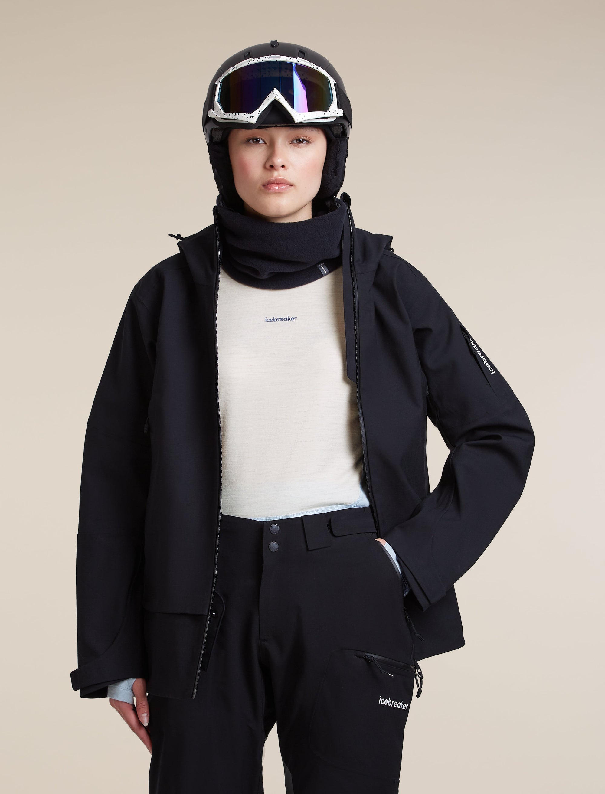 Icebreaker Women's Merino 200 Oasis+ Long Sleeve Crewe in Zinc Blue / Ecru Heather / Dawn, worn
