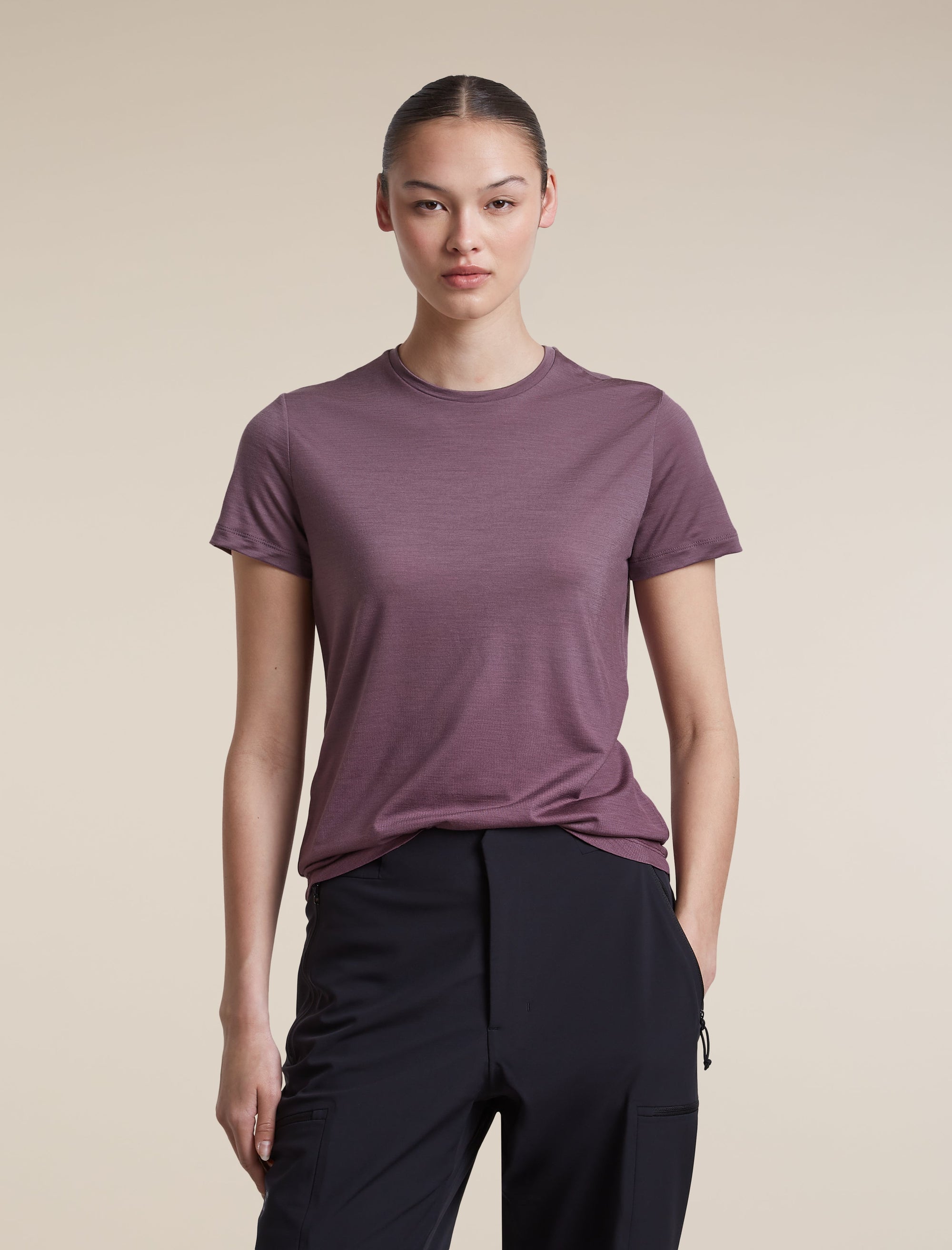 Icebreaker Women's Merino Blend 125 Cool-Lite Sphere Short Sleeve Tee Alta in Grey Plum, worn