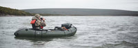 Hunter Scoping on the water with his gear