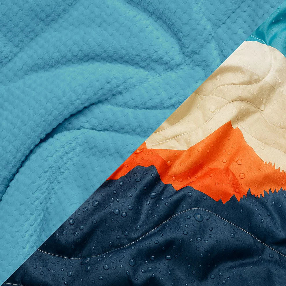 Fleece Puffy Blanket - Teton Glow