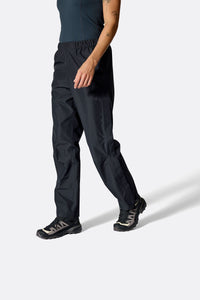 Rab Women's Downpour Waterproof Pants in Black, worn front