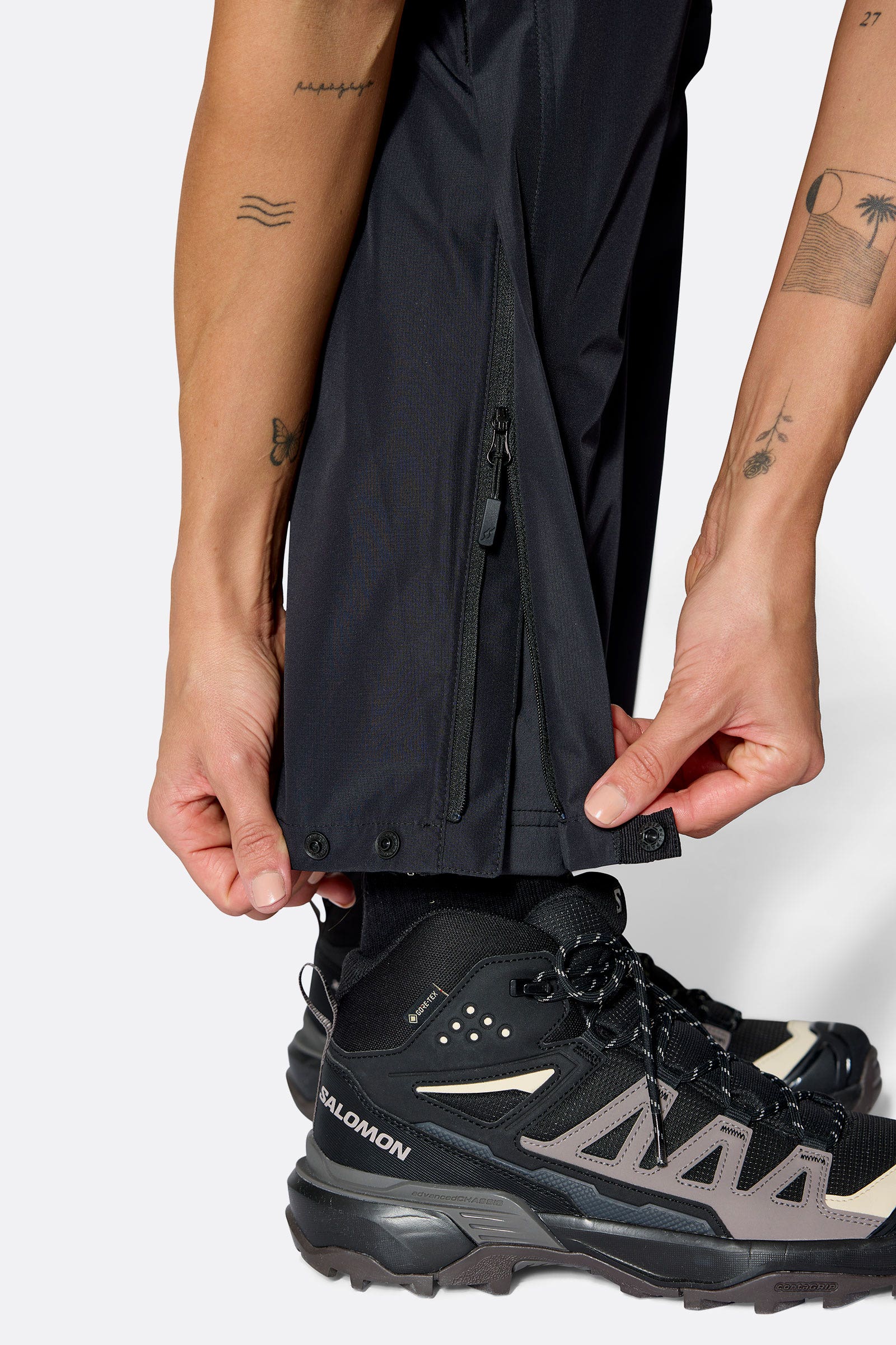 Rab Women's Downpour Waterproof Pants in Black, hem detail